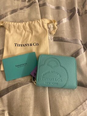 Tiffany & Co. Aqua Blue Pebbled Leather Zip Wallet